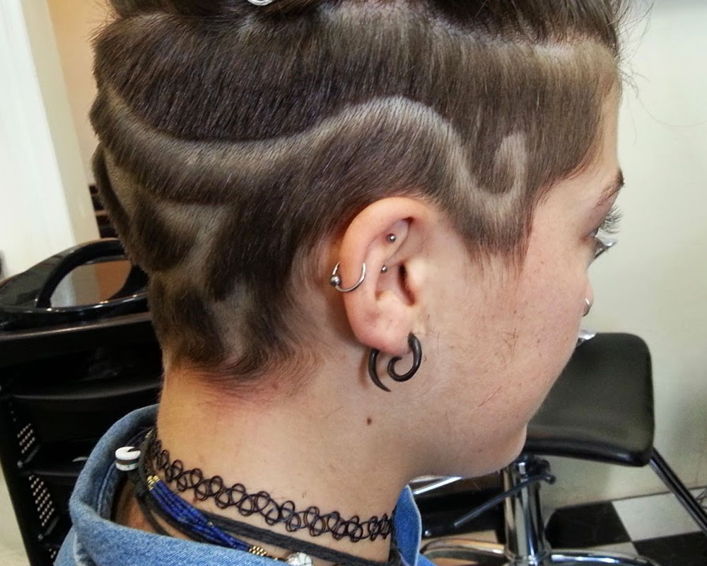 egytian eye swirls hair tattoo 1