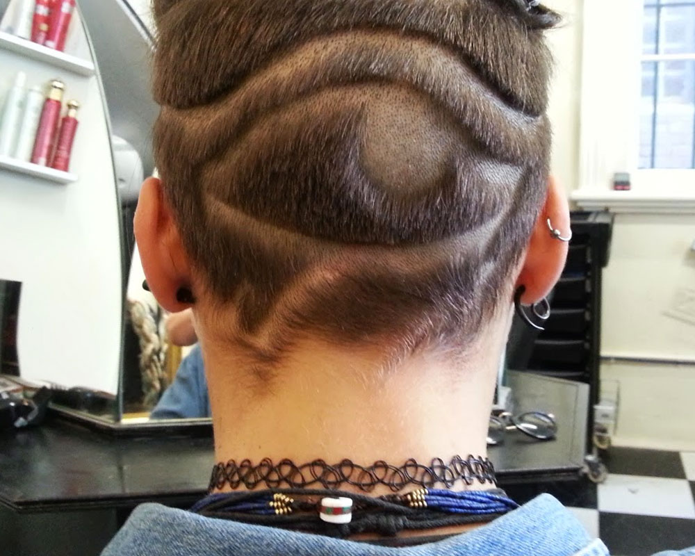 egytian eye swirls hair tattoo 2